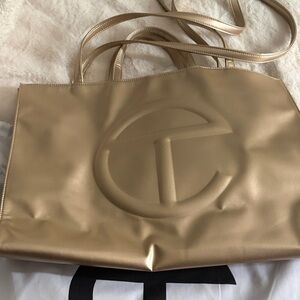 Telfar Metallic Gold Tote with Embossed Logo